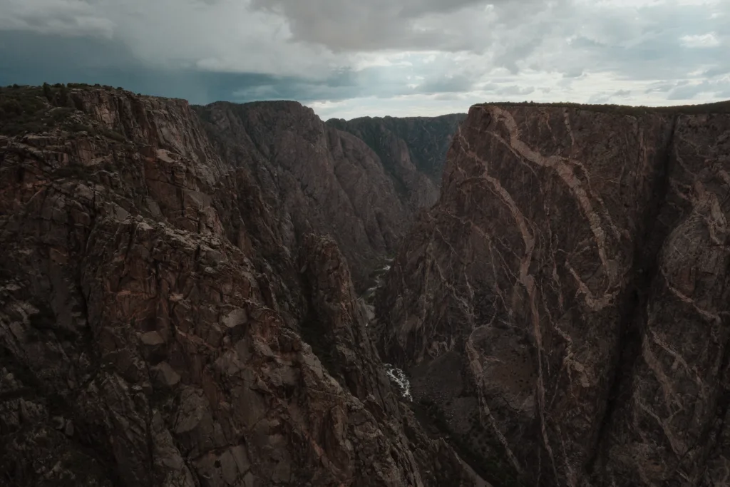 Black Canyon of the Gunnison Walls with river running in the bottom middle.