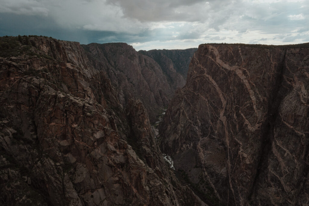 Black Canyon of the Gunnison Walls with river running in the bottom middle.